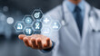 © Antto-AI - Doctor in white coat holds glowing medical icons in open palm, symbolizing healthcare innovation