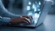 © AK vactor - Person using a laptop with glowing digital interface displaying user profiles and data