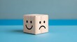 © Shameem - Happy and Sad Faces on Wooden Cube | Emotional State Concept for Mental Health Awareness and Psychological Well-being