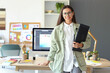 © Pixel-Shot - Female interior designer with graphic tablet in office