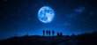 © rangga - Silhouetted Figures Under a Giant Blue Moon and Starry Sky