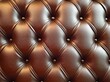 © app - Close-up of brown tufted leather upholstery with shiny buttons creating a textured diamond pattern