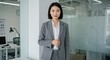 © Arvi - Confident businesswoman in office