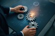 © Thitiporn - Interlocking Gears: A close-up of a business person's hands delicately arranging precision-engineered gears, highlighting interconnected processes, cooperation and collaborative strategies.