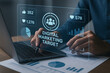 © techgiants - A professional interacting with a holographic digital marketing target dashboard, visualizing data analytics and performance metrics for strategic growth