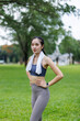 © David - Young asian female exercise in park in morning, Happy and smiled woman workout and relax before fitness training, warm up concept