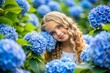 © ARTSPRIO - Young girl is posing in front of a field of blue flowers