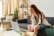 © Bliss - Enjoying a cozy afternoon at home while engaged in an online activity