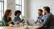 © MST - Diverse team collaborating effectively in a modern office environment
