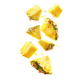 High quality photo of fresh pineapple chunks falling and splattering isolated on transparent background.