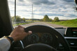 © Connect Images - A person driving on a scenic, open road with a clear sky and lush greenery. Black Forest, Germany