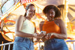 © Hector Pertuz - Friends enjoying a fun night at the carnival