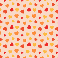 Wall Mural - Autumn in my heart.Seamless pattern with colorful hearts in orange yellow red isolated on background.Vector graphic valentine background.