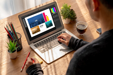 Wall Mural - graphic designer software for modern design of web page and commercial ads showing on the computer s