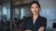 © Johannes - Confident smiling businesswoman corporate portrait. Arabian hispanic latino woman boss poses with crossed arms in office. Female leader, successful executive looks at camera. Business, career, modern