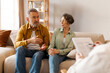 © Home-stock - Unhappy retired senior couple having consultation with psychologist, listening to his advice, seeking help in their problem