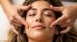 © soysuwan123 - A woman with closed eyes enjoys a relaxing facial massage, highlighting serenity and skincare wellness.