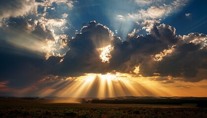 Wall Mural - sun rays piercing through dark clouds background dramatic beams of golden light breaking through