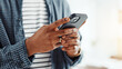 © peopleimages.com - Business, hands and man in workplace, cellphone and message to contact, copywriting and social media. Closeup, person and journalist with smartphone, app or subscription for online magazine or email