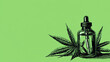 © vita - A dropper bottle with cannabis leaves on a green background. An illustration of a cosmetic or medical serum filled with liquid next to a cannabis leaf. The image is in a black white line drawing style