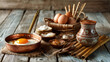 © Mahmud - A classic Turkish village breakfast setup on a wooden surface featuring a copper pan for eggs, a ceramic pot, and a bamboo serving set