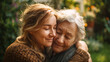 © Naufal - A grown daughter gently hugging her elderly mother, showing love, care, and warmth, family bonding, emotional moment, tender connection between generations.