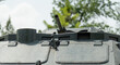 © ROMAN_P - Close-up of  turret with mounted machine gun, hatches, and protective armor elements.