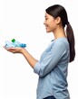 © ruangrit19 - Happy Woman Holding Recycled Plastic Bottles Promoting Sustainability.