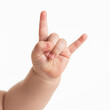 © Nimra - Baby hand showing rock and roll sign
