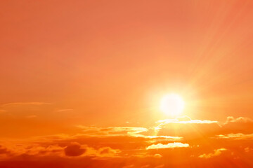 Wall Mural - orange sky with clouds during hot summer weather
