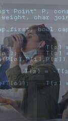 Wall Mural - animation of financial data processing over business people wearing face masks working in office