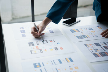 Two woman Designing UX UI and Programming