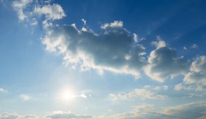 Wall Mural - beautiful blue sky with soft white clouds for abstract background