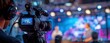 © Divine123victory - Professional Camera Recording a Live Event with Bokeh Background