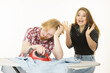 © Voyagerix - Happy woman and bored man ironing clothes