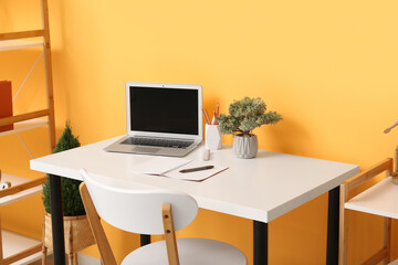 Wall Mural - interior with comfortable workplace near color wall