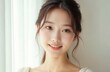 © Pete - Portrait of beautiful Asian woman with clear, healthy skin, smiling gently. Fresh, natural look, embodying wellness, beauty care. Ideal for cosmetic, skincare promotions, image conveys rejuvenation,