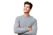 © luismolinero - Young handsome caucasian man over isolated background looking up while smiling