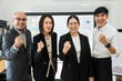 © Chanakon - Asian business people team analyzing statistics financial. Group Team of ceo business man and woman Meeting Conference Discussion various topic. Executive professional managers Corporate in office.