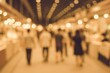 © AkuAku - Vintage-style abstract blurred photo of individuals strolling through a commercial complex or exhibition space with bokeh backdrop.