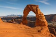 © AkuAku - Scenic desert landscape featuring a natural arch formation and geological marvels