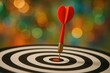 © pngking - Fuzzy red arrow striking the bullseye on a dartboard with vibrant bokeh background, symbolizing success and achievement.