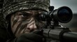 © nad - Focused sniper with camouflage and rifle scope targeting an unseen adversary