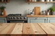 © ThomasLENNE - Kitchen wood table top for product display with blurred modern interior. Wooden tabletop over defocused kitchen background. kitchen furniture and desk space. product promotion in the kitchen