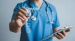 © Shabbir - Medical professional completing a checklist, highlighting patient care and healthcare management efficiently in the medical field.