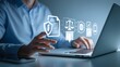 © Arnab Dey - Compliance in business concept. Businessman using laptop with compliance icon, ensuring the enforcement of laws, regulations, and standards. Stay in line with business policies.