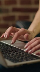 Unknown Caucasian entrepreneur woman hands typing laptop online working freelance keyboard businesswoman female arms fingers use computer office worker student pc website programming business at home