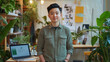 © Dirk - Confident asian male entrepreneur in trendy startup office. Inclusive representation of gender and ethnicity, with, Ideal for themes  innovation, entrepreneurship, personal branding, tech startups, an