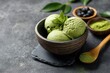 © LimeSky - Bowl of matcha ice cream on a gray stone surface