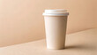 © MidStock - Mockup Coffee Paper Cup on Beige Background